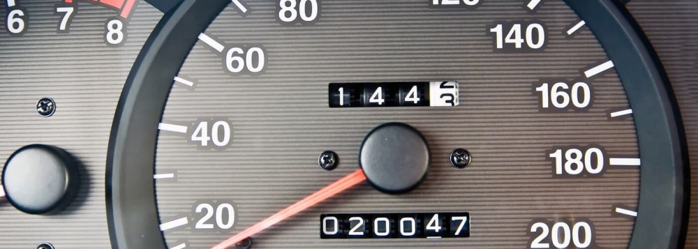 is a low mileage used car better